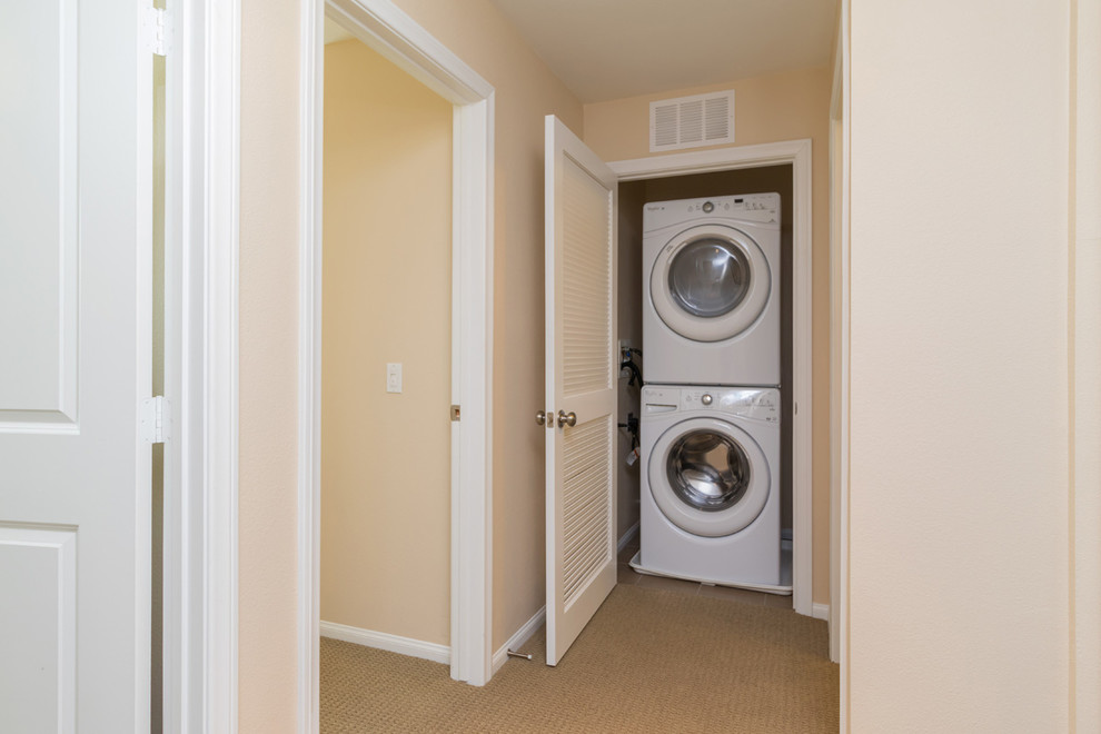 Design ideas for a transitional laundry room in San Diego.