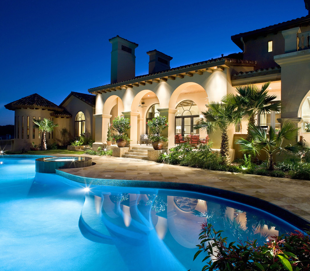 This is an example of a mediterranean custom-shaped pool in Other.