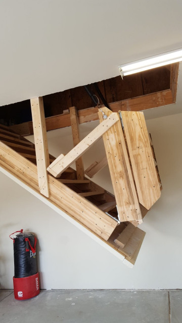 Retractable Stairs folded going into attic 