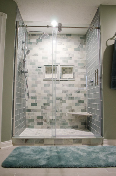 Inspiration for a mid-sized transitional master bathroom in Indianapolis with an alcove shower, beige tile, gray tile, green tile, green walls, ceramic floors and subway tile.