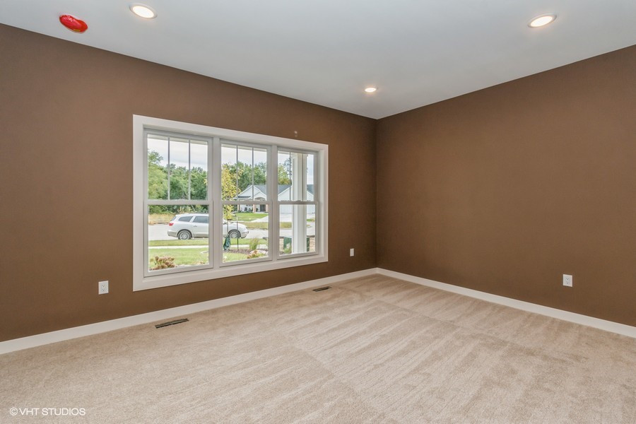 Transitional home design photo in Cedar Rapids