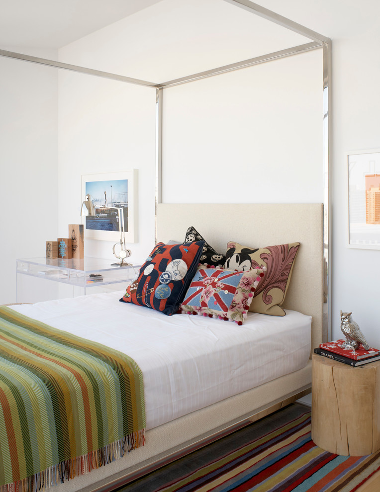 Inspiration for a large contemporary master light wood floor bedroom remodel in Chicago with white walls