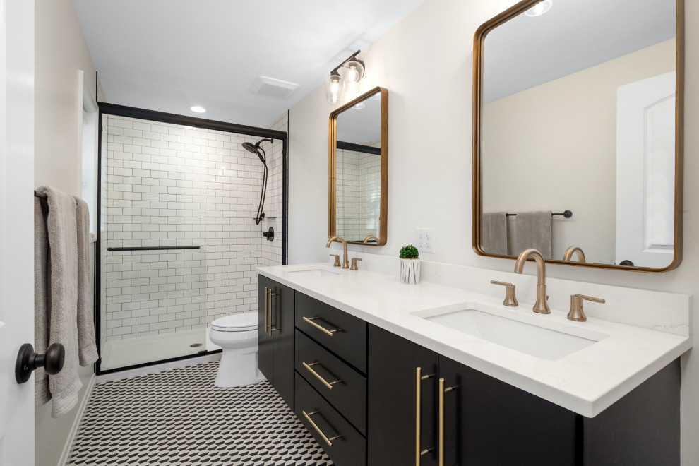 Photo of a mid-sized modern master bathroom in St Louis with flat-panel cabinets, black cabinets, gray tile, ceramic tile, engineered quartz benchtops, white benchtops, a double vanity and a floating vanity.