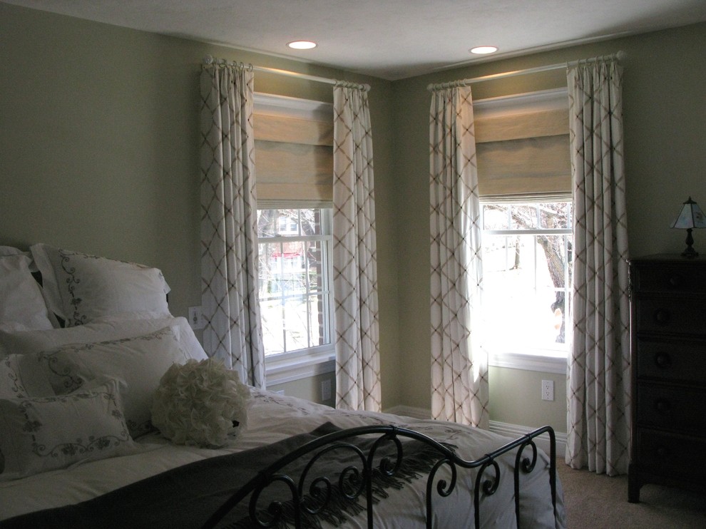 This is an example of a mid-sized arts and crafts master bedroom in Other with green walls and carpet.