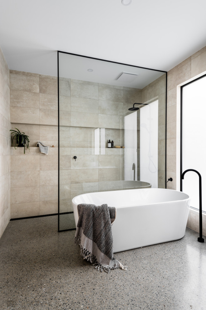 This is an example of a contemporary cream and black bathroom in Geelong.