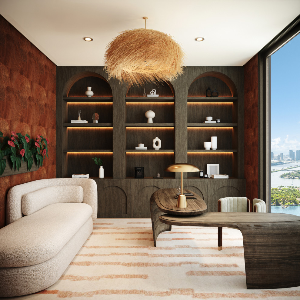 Inspiration for a large modern study in Miami with orange walls, light hardwood flooring, a freestanding desk, beige floors and wallpapered walls.