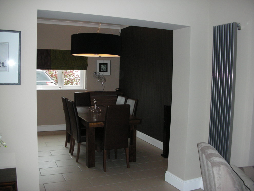 This is an example of a contemporary dining room in Glasgow.