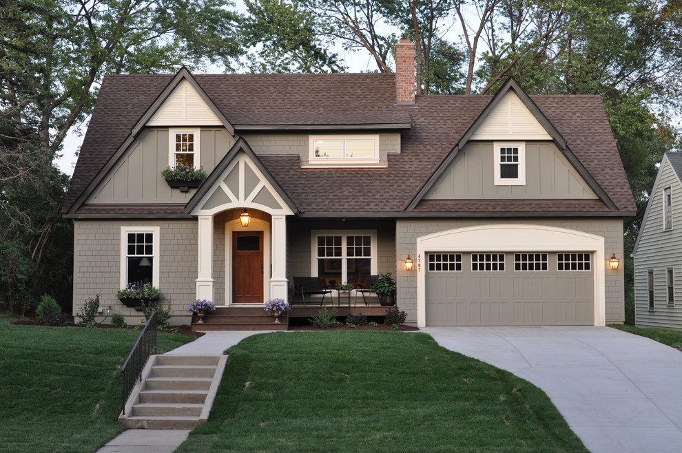 Photo of a traditional exterior in Minneapolis with wood siding and a gable roof.