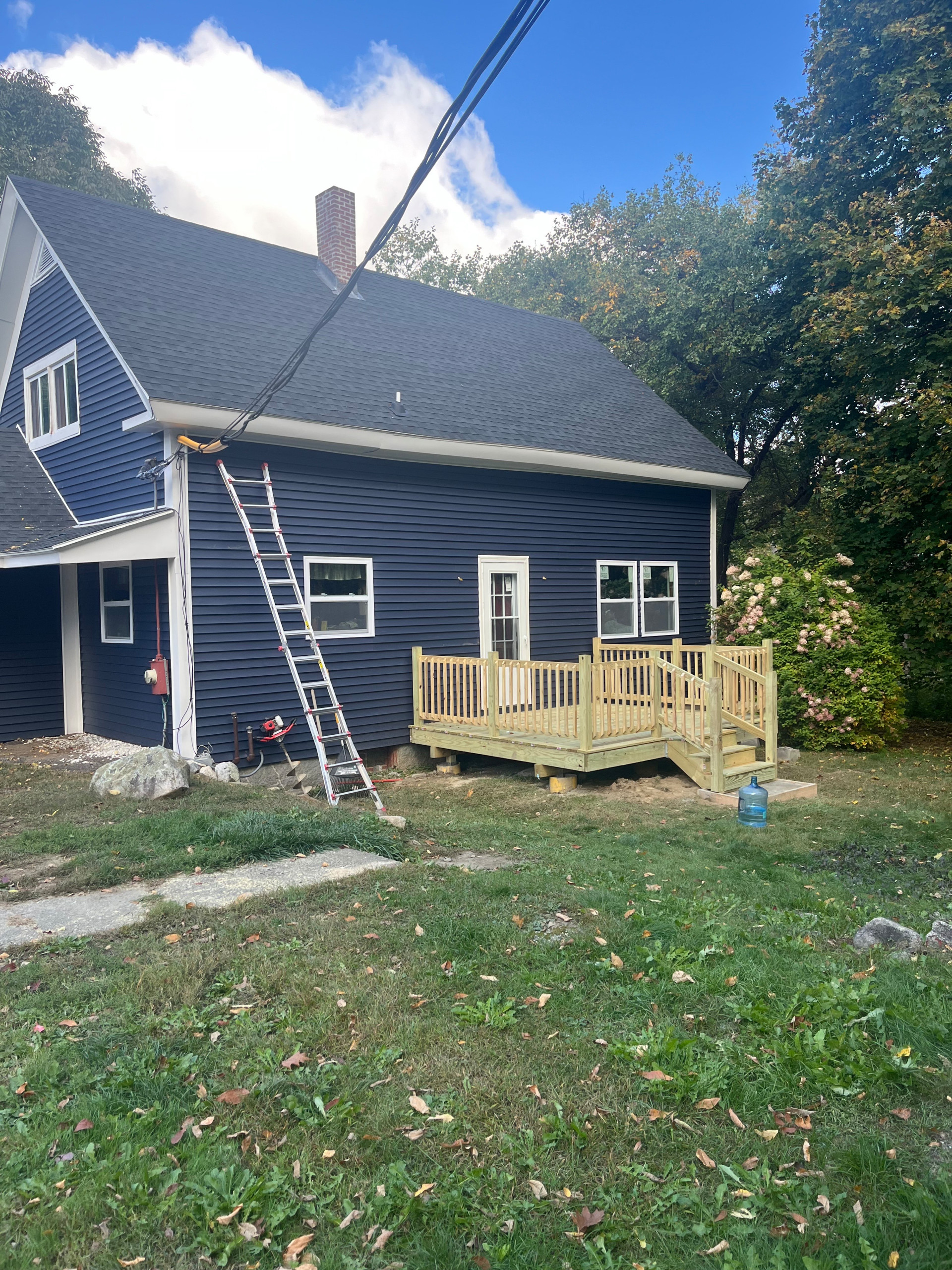 New Siding, Windows, Door, Aluminum Trim, And New PT Deck
