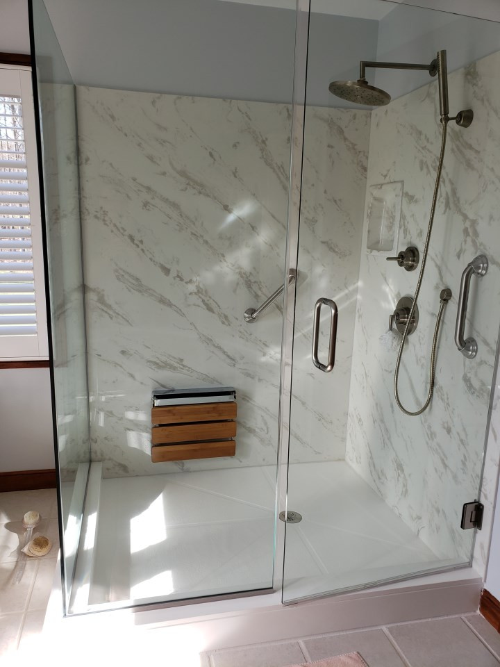 Design ideas for a mid-sized transitional master bathroom in Other with raised-panel cabinets, a claw-foot tub, an alcove shower, a two-piece toilet, blue walls, porcelain floors, an undermount sink, solid surface benchtops, grey floor, a hinged shower door and multi-coloured benchtops.