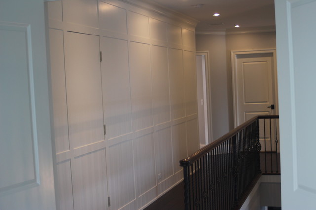 wainscot wall with hidden door