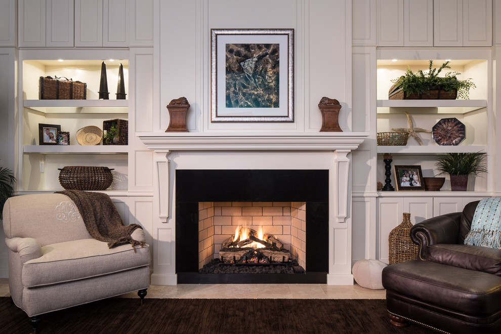 Design ideas for a traditional living room in Tampa with white walls and a standard fireplace.