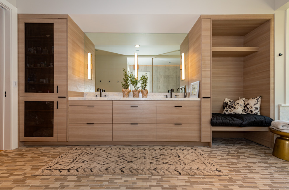This is an example of an expansive country master bathroom in San Francisco with flat-panel cabinets, distressed cabinets, an undermount tub, a curbless shower, a wall-mount toilet, beige tile, porcelain tile, grey walls, mosaic tile floors, an undermount sink, quartzite benchtops, beige floor, an open shower, white benchtops, a shower seat, a double vanity and a built-in vanity.