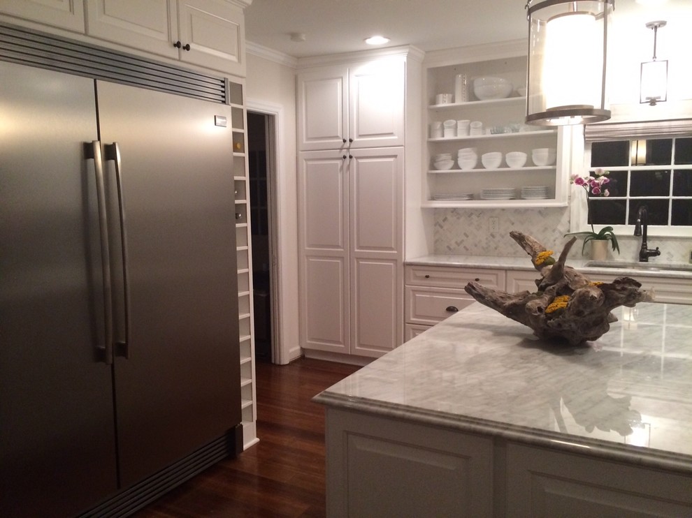 Example of a huge transitional u-shaped dark wood floor eat-in kitchen design in Charlotte with an undermount sink, raised-panel cabinets, white cabinets, granite countertops, gray backsplash, porcelain backsplash, stainless steel appliances and an island