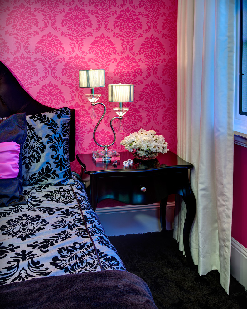 Mid-sized traditional guest bedroom in Orange County with pink walls, carpet, no fireplace and black floor.