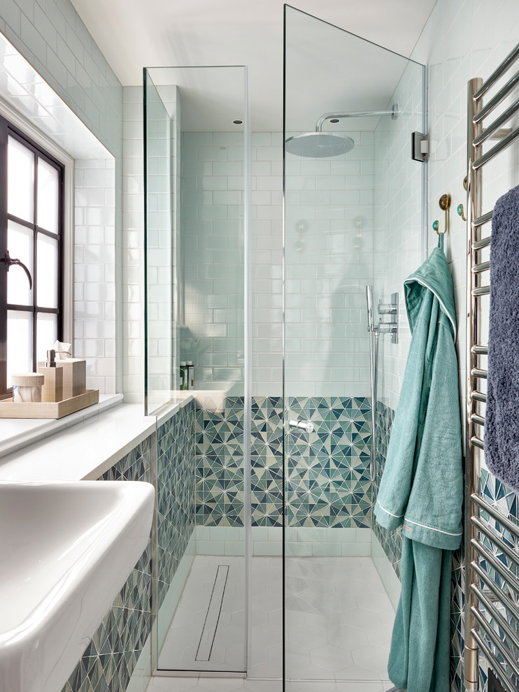 Design ideas for a transitional 3/4 bathroom in Other with an alcove shower, multi-coloured tile, subway tile, multi-coloured walls, a drop-in sink, white floor and a hinged shower door.