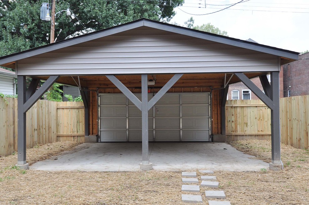 Inspiration for a mid-sized transitional detached two-car carport in St Louis.