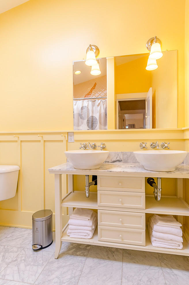 Example of a transitional home design design in New Orleans