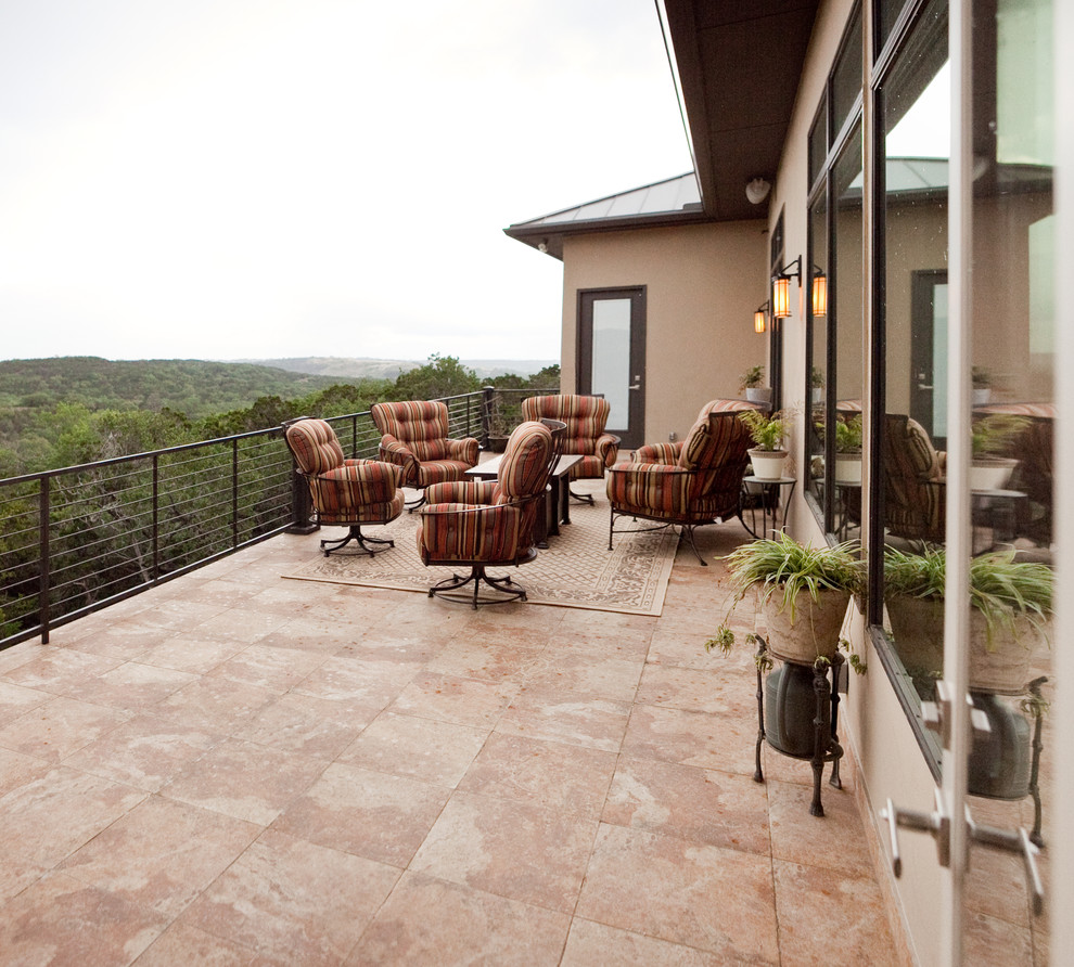 Photo of a transitional backyard deck in Austin with no cover.