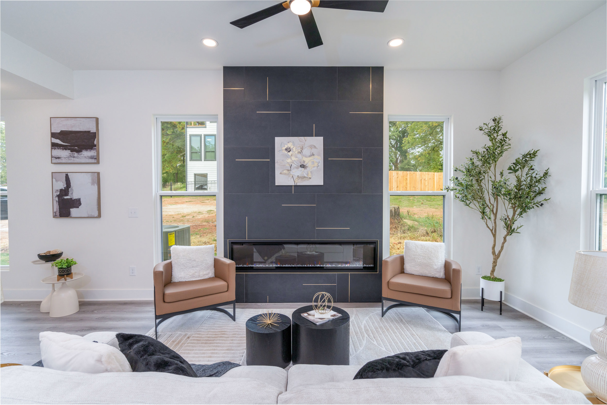 Trendy open concept living room photo in Atlanta with white walls and a ribbon fireplace