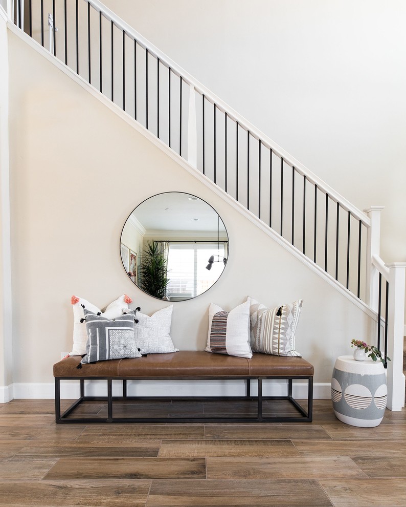 Beach style straight staircase in Sacramento with mixed railing.
