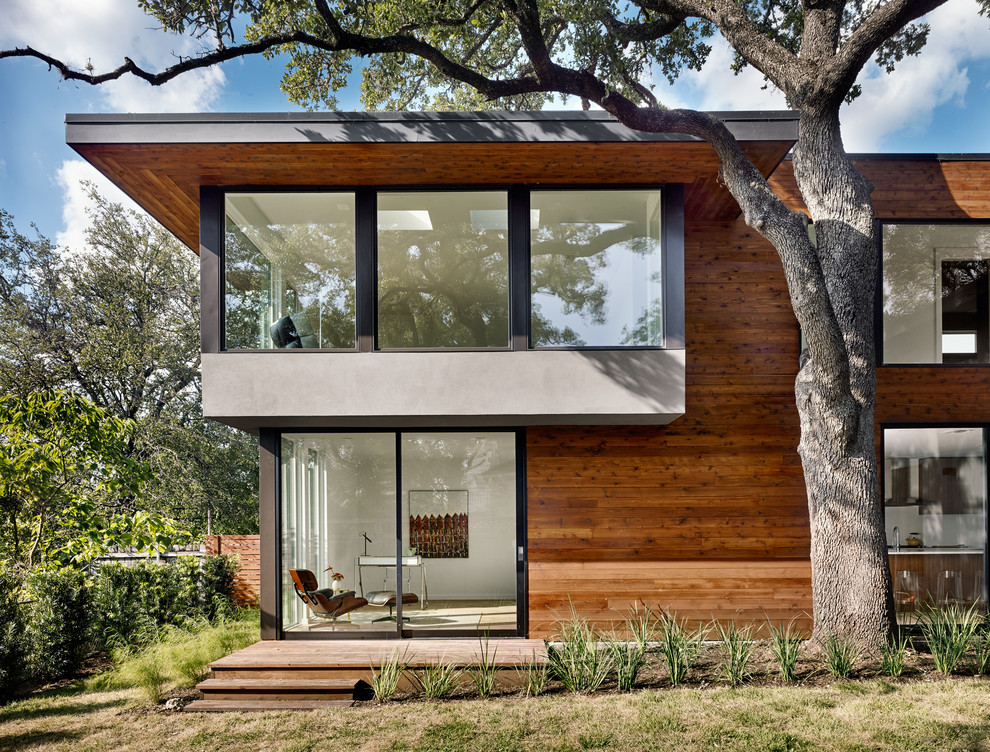 Inspiration for a contemporary exterior in Austin with wood siding.