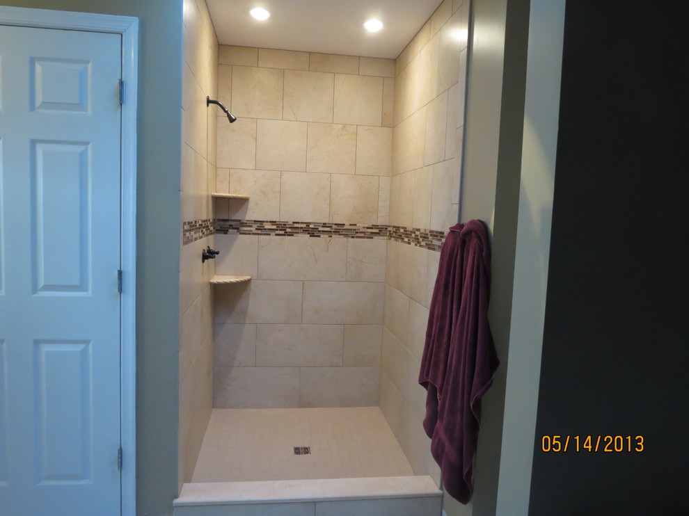 Mid-sized transitional master beige tile and porcelain tile dark wood floor bathroom photo with shaker cabinets, dark wood cabinets, beige walls, granite countertops and an undermount sink
