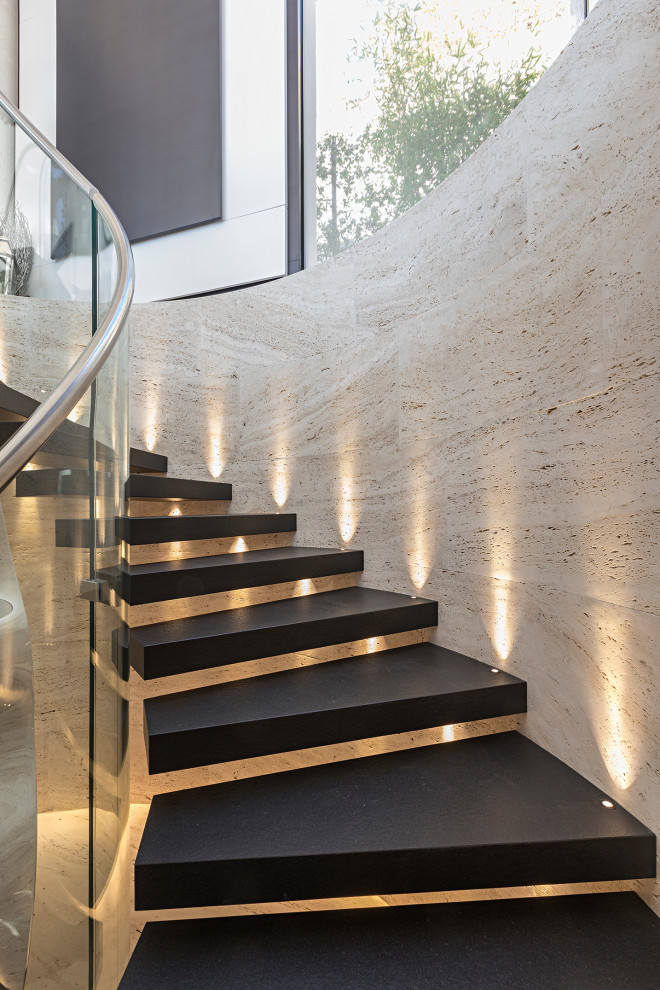 Modern marble curved staircase in Milan.