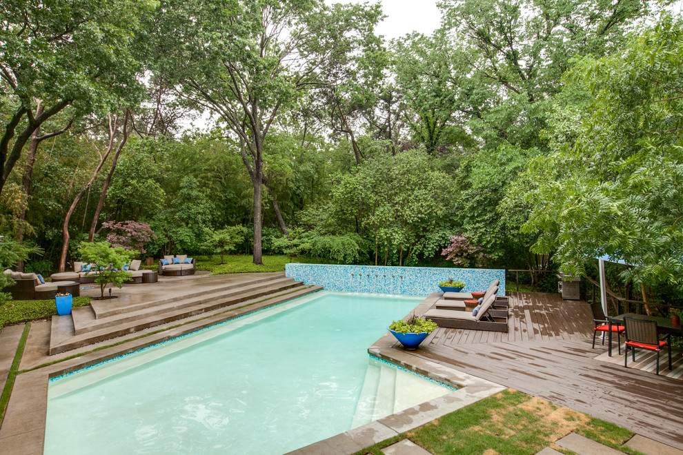 Inspiration for a contemporary pool in Dallas with decking.