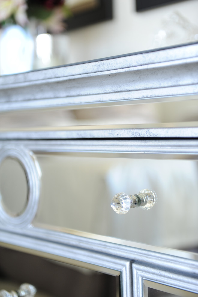 Inspiration for a mirrored transitional glass rectangular 3-drawer and 2-door home design remodel in Vancouver with glass doors
