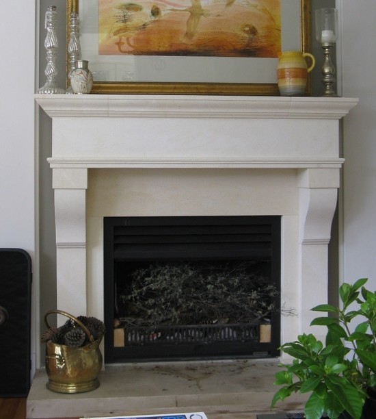 Design ideas for a country living room in Auckland with a stone fireplace surround.