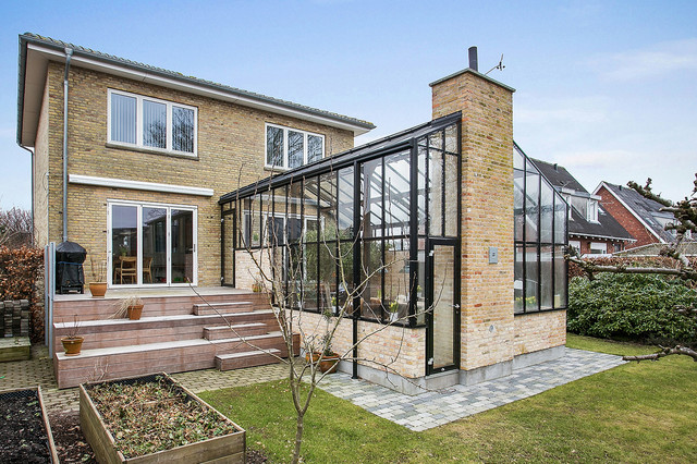 Addition Gives This Family A Living Room In A Glass Conservatory