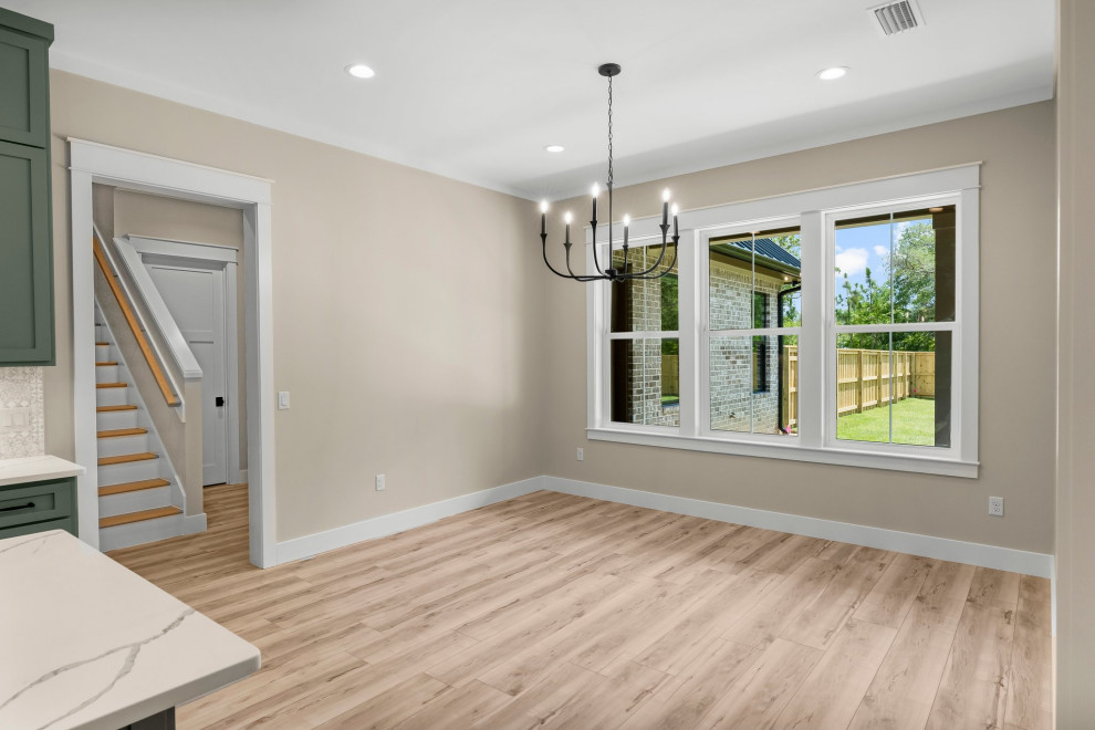 Mid-sized arts and crafts vinyl floor and beige floor great room photo with beige walls