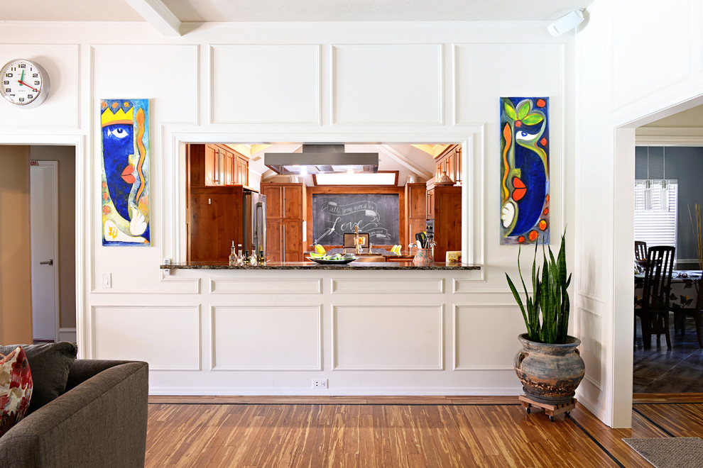Example of a large transitional u-shaped travertine floor eat-in kitchen design in Dallas with a farmhouse sink, medium tone wood cabinets, granite countertops, multicolored backsplash, matchstick tile backsplash, stainless steel appliances and a peninsula