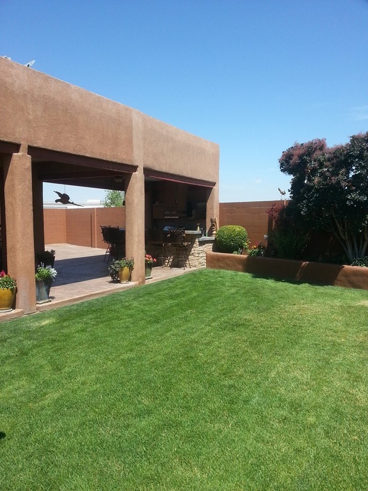 Mountain style home design photo in Albuquerque