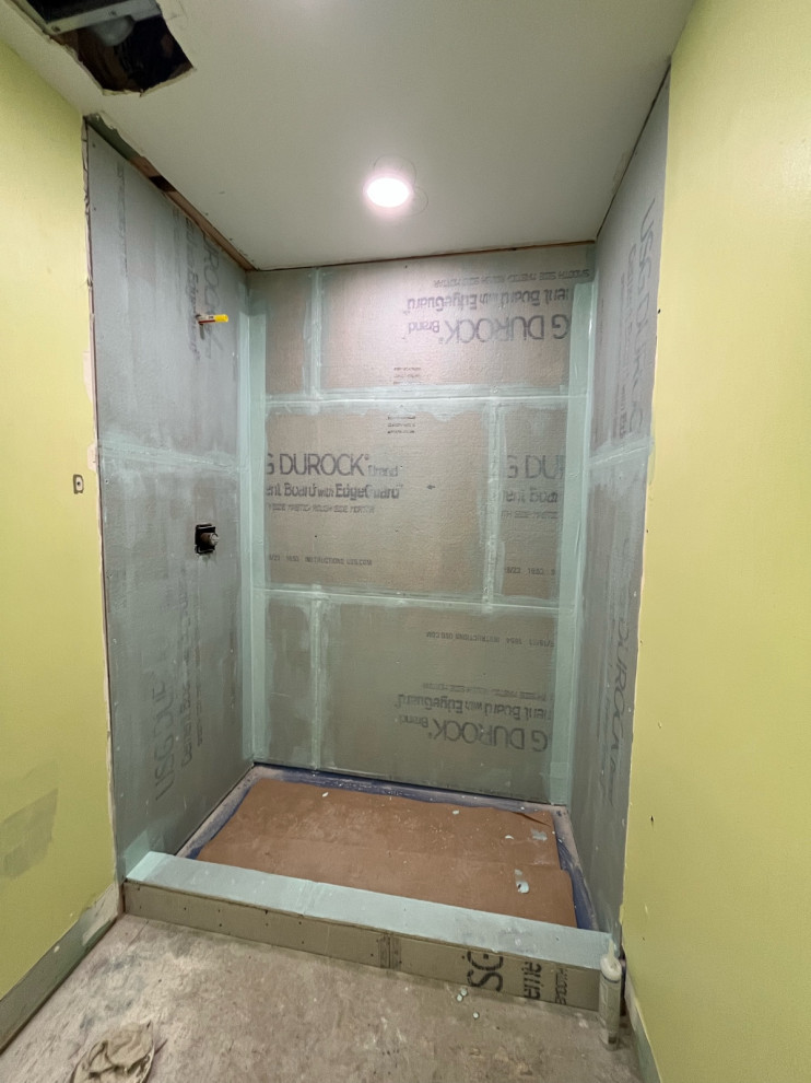 No thinset on Durock cement board for shower wall?