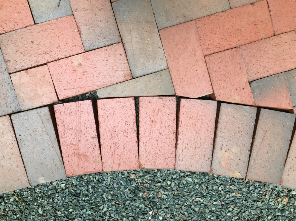 Brick walkway Gaps in soldier course edging