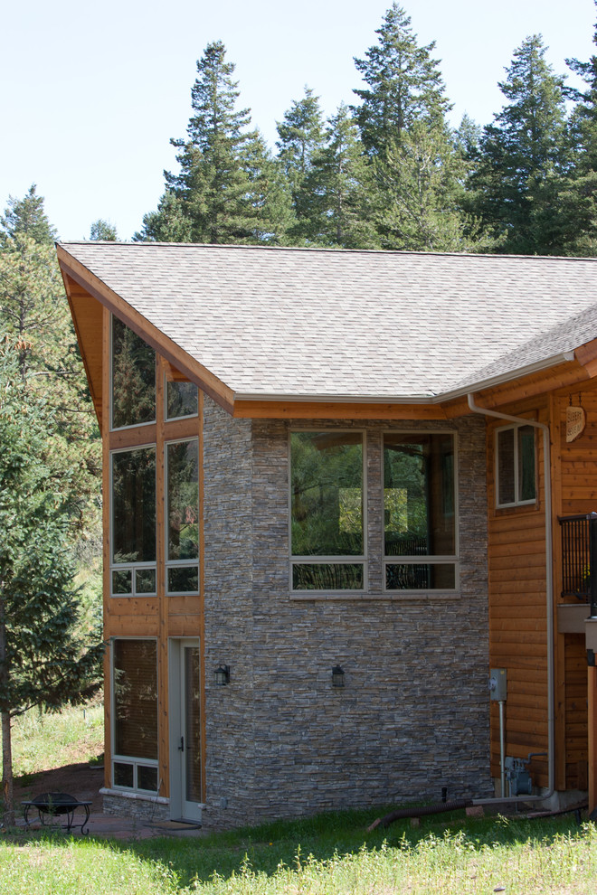 Mountain style home design photo in Denver