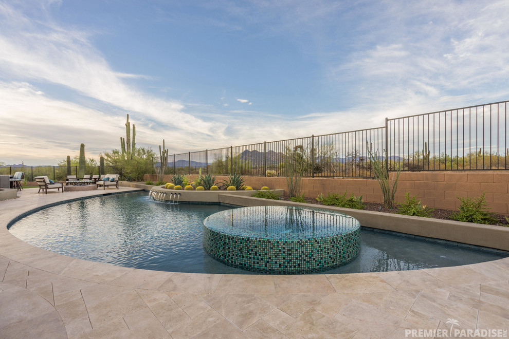Design ideas for a mid-sized transitional pool in Phoenix.