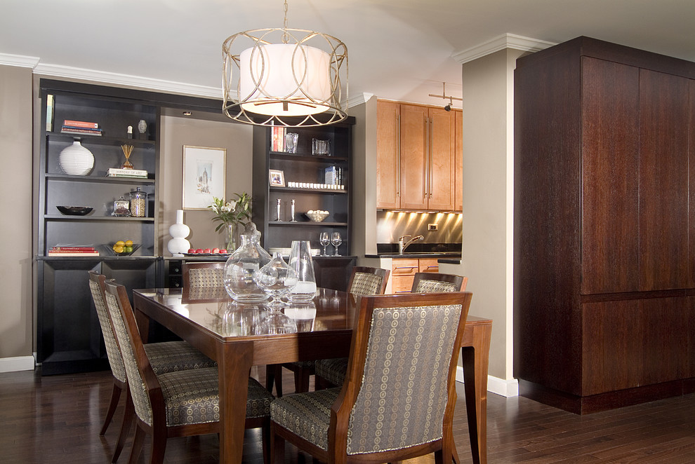 Photo of a mid-sized eclectic kitchen/dining combo in New York with grey walls and dark hardwood floors.