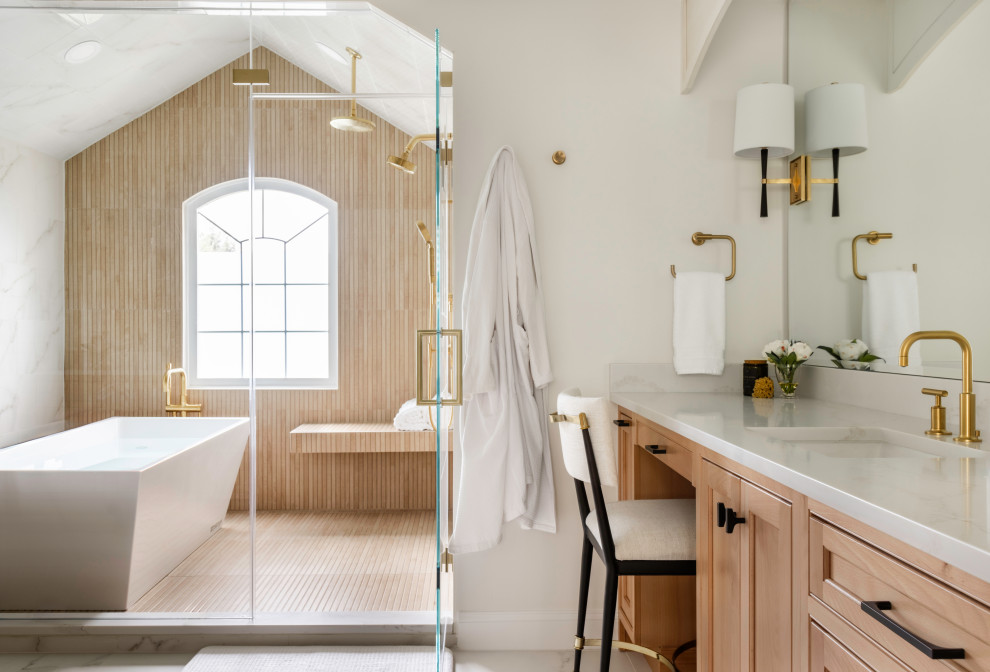 Bathroom - transitional master beige tile white floor bathroom idea in DC Metro with shaker cabinets, light wood cabinets, white walls, an undermount sink, a hinged shower door, white countertops and a built-in vanity