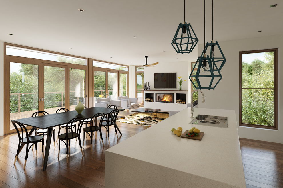 Mid-sized contemporary open plan dining in Melbourne with white walls and medium hardwood floors.