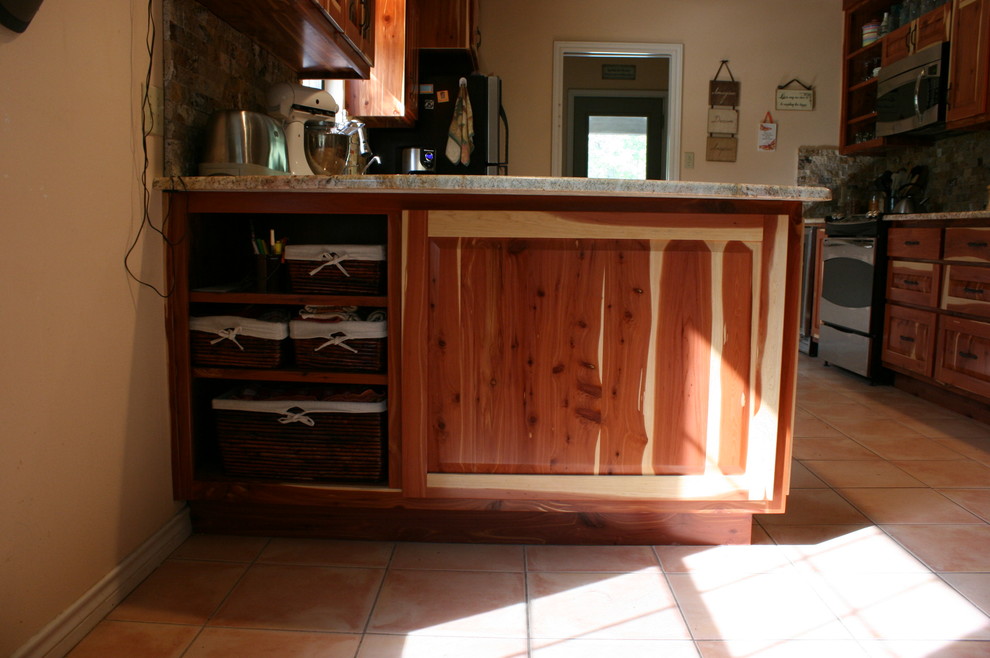 Example of a mountain style kitchen design in Austin