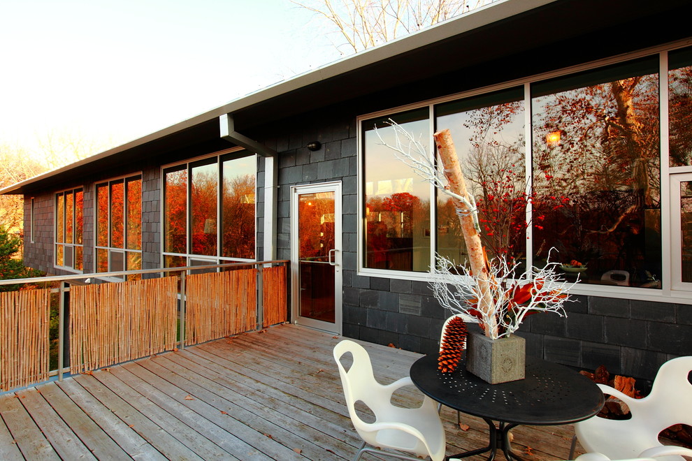 This is an example of a contemporary deck in Kansas City with no cover.