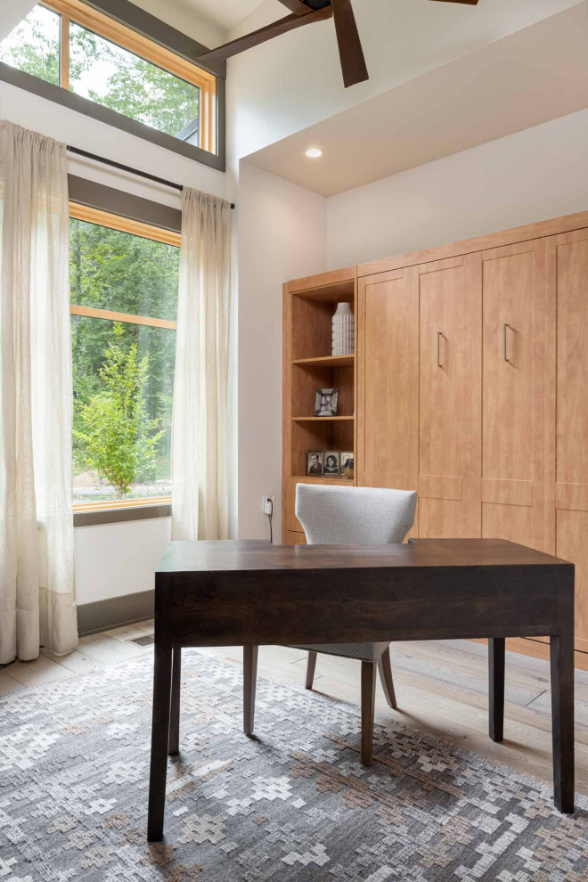 Home office - mid-sized transitional home office idea