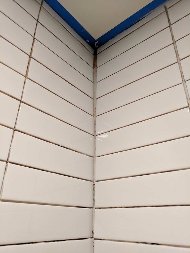 Corner grout line widining as approaches ceiling. Advice Needed!