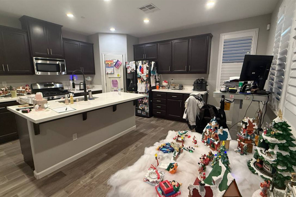 BEFORE: ORIGINAL KITCHEN LAYOUT — ISLAND & RANGE VIEW