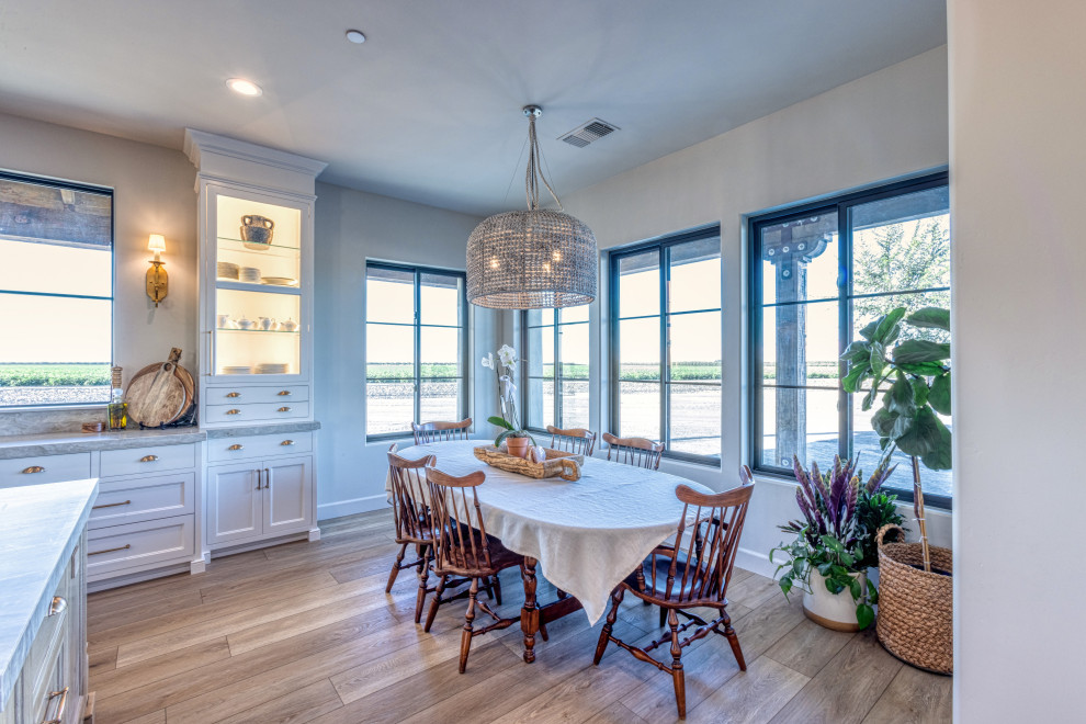 Breakfast Nook with Expansive Black-Framed Windows | Tuscan Farmhouse