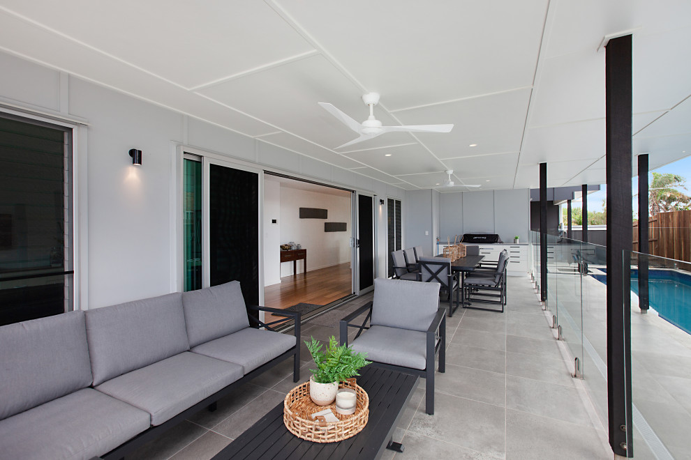 Design ideas for a beach style patio in Sunshine Coast.