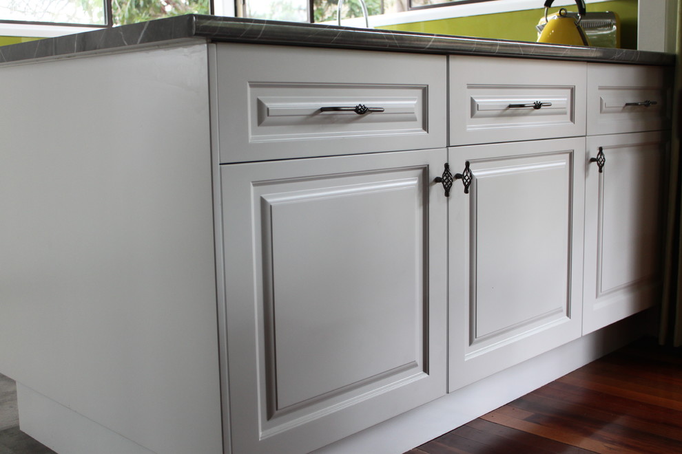 This is an example of a transitional kitchen in Brisbane.
